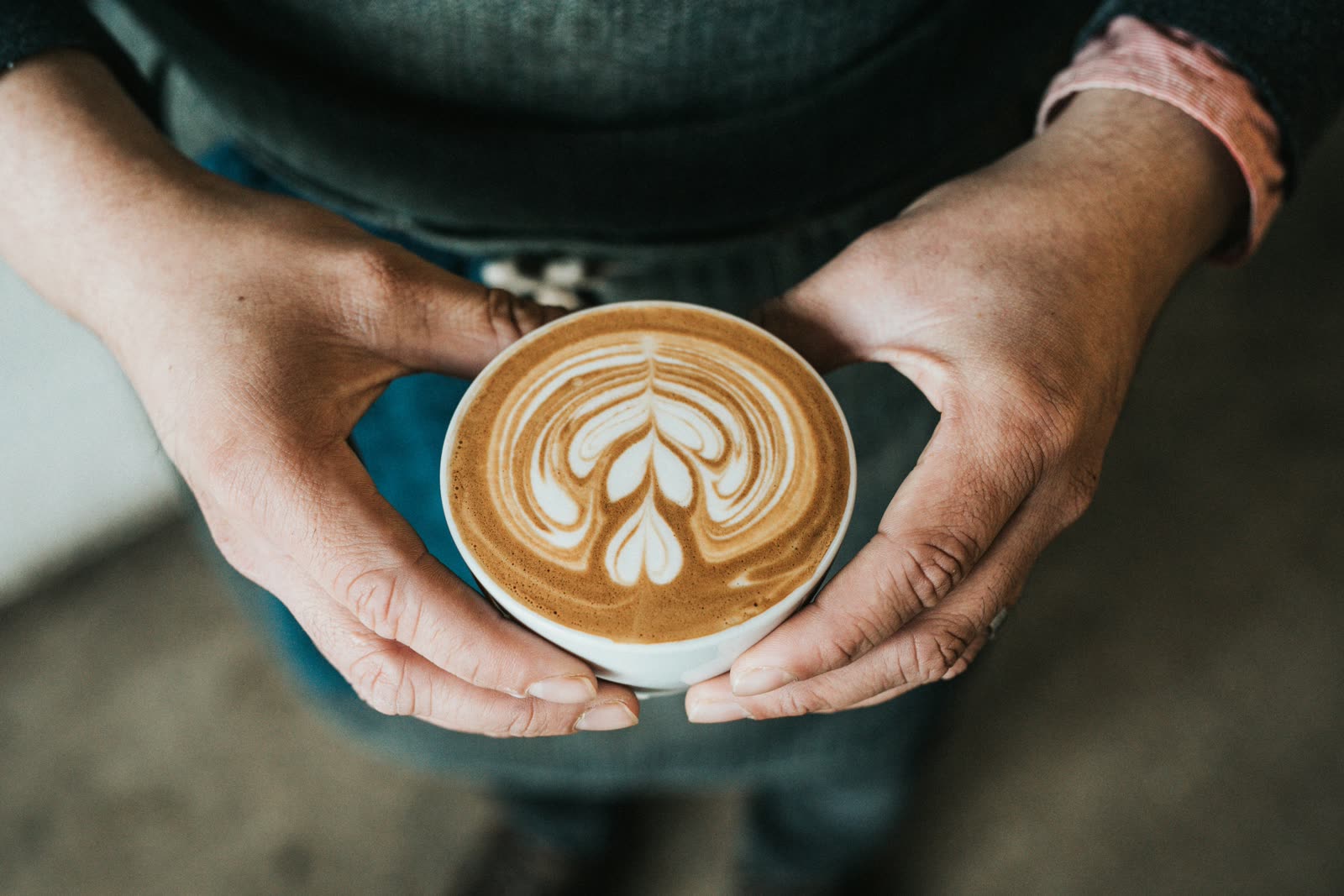Hand pouring latte art